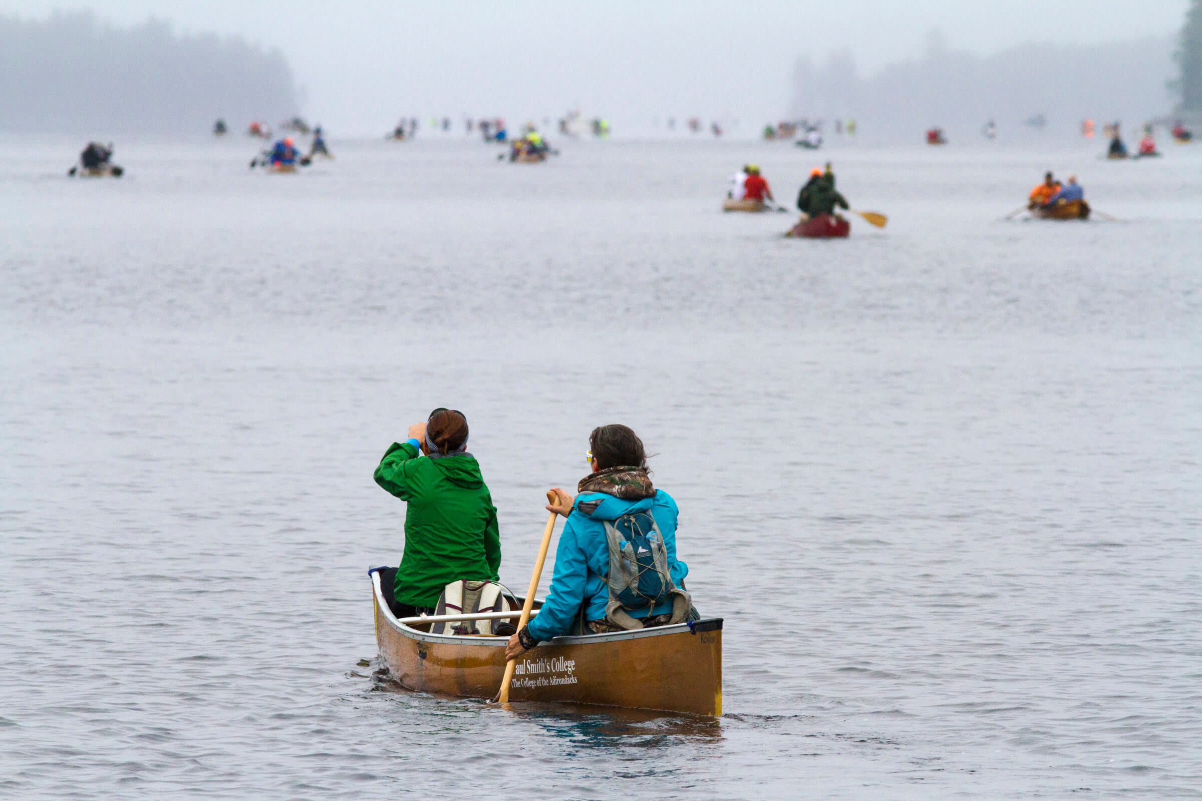 Paddlers make their way down Long Lake on day 2 of the 90-Miler. 