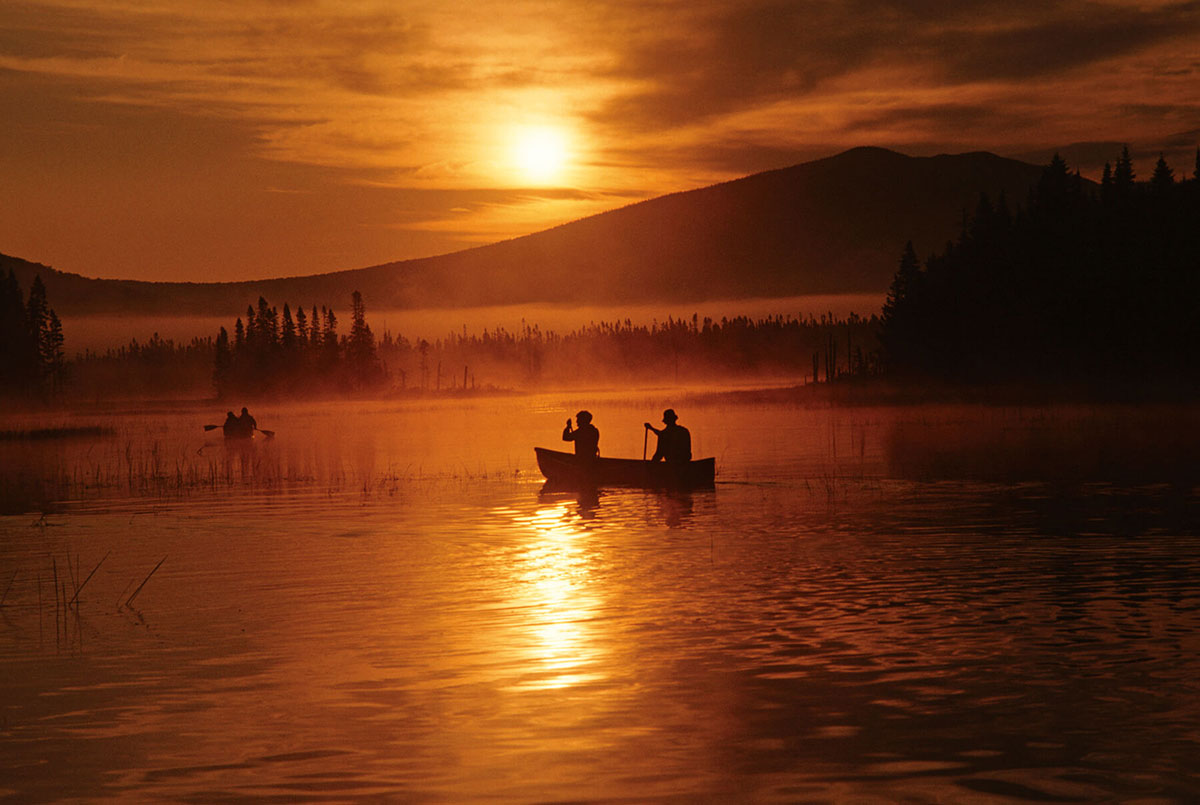 paddling at sunset