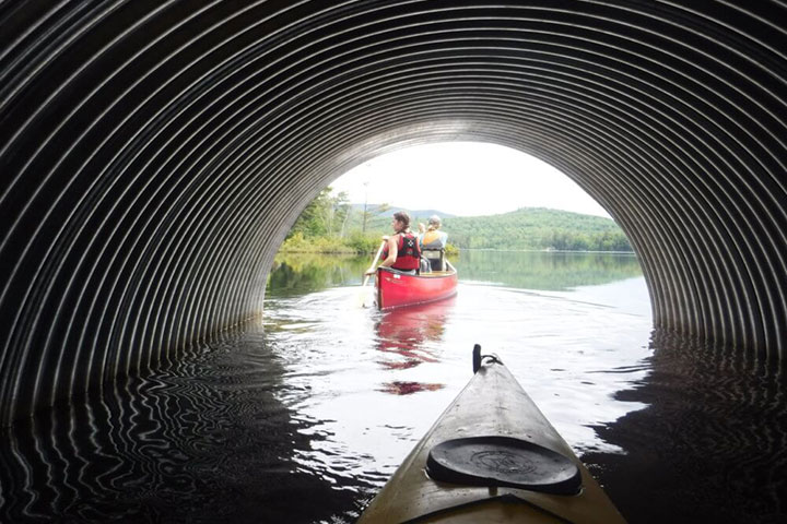 kayaking through tunnel